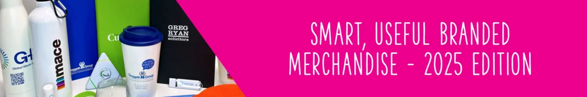 Branded Merchandise 2025 A colourful display of custom branded promotional products including mugs, bottles, notepads and pens.